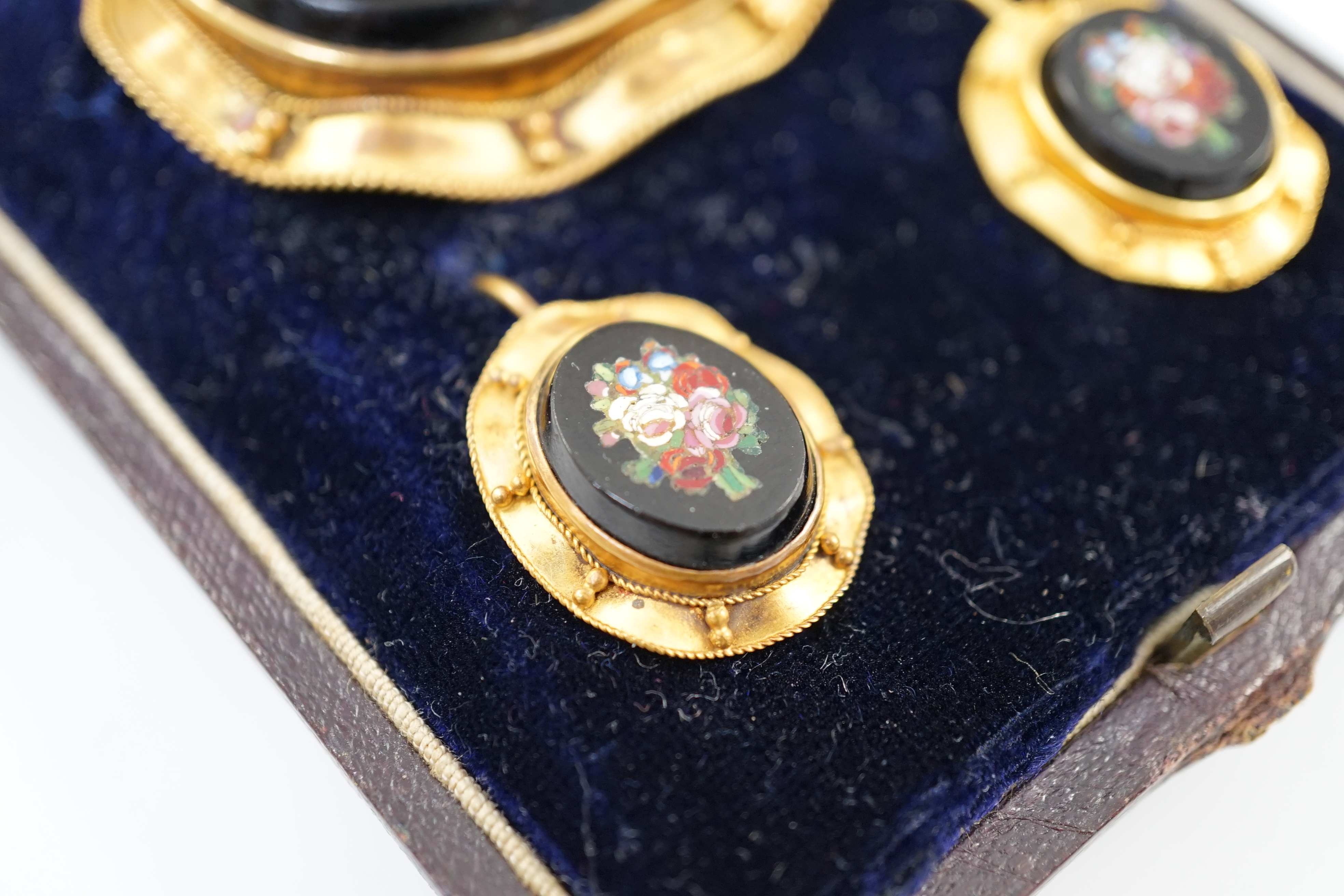 A Victorian gold mounted micro mosaic black onyx demi-parure